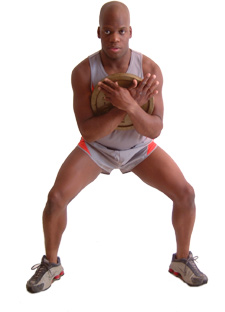 raise feet up and out to the sides