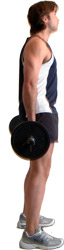 stand with the weight behind your buttocks